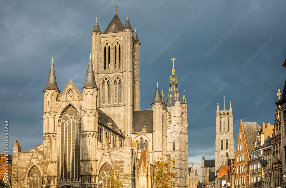 Ghent city historical center with Saint Nicholas cathedral facade, Belfry and saint Bavo's cathedral in the background, Flemish Region, Belgium
