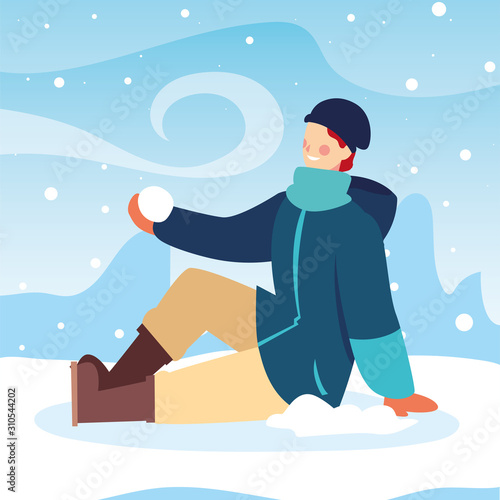 man with winter clothes in landscape with snowfall
