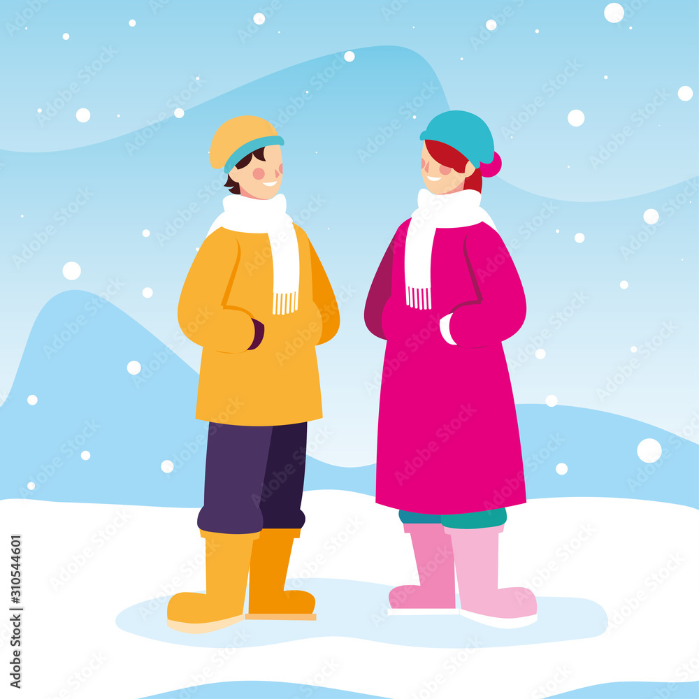 couple of people with winter clothes in landscape with snowfall