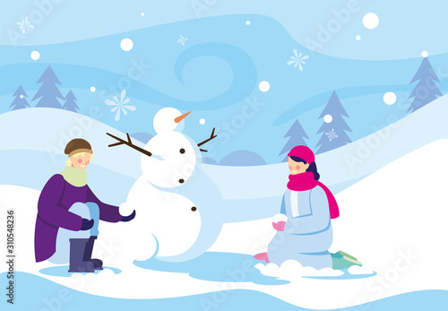 couple of people with snowman in winter landscape