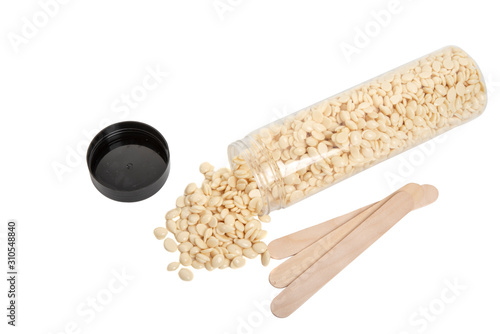 spa wax for depilation in granular form on the white background photo