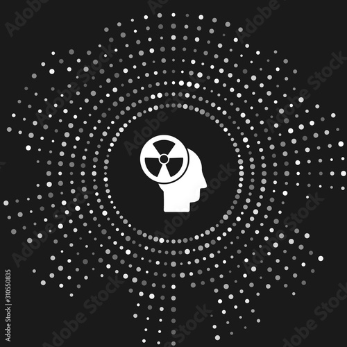 White Silhouette of a human head and a radiation symbol icon isolated on grey background. Abstract circle random dots. Vector Illustration