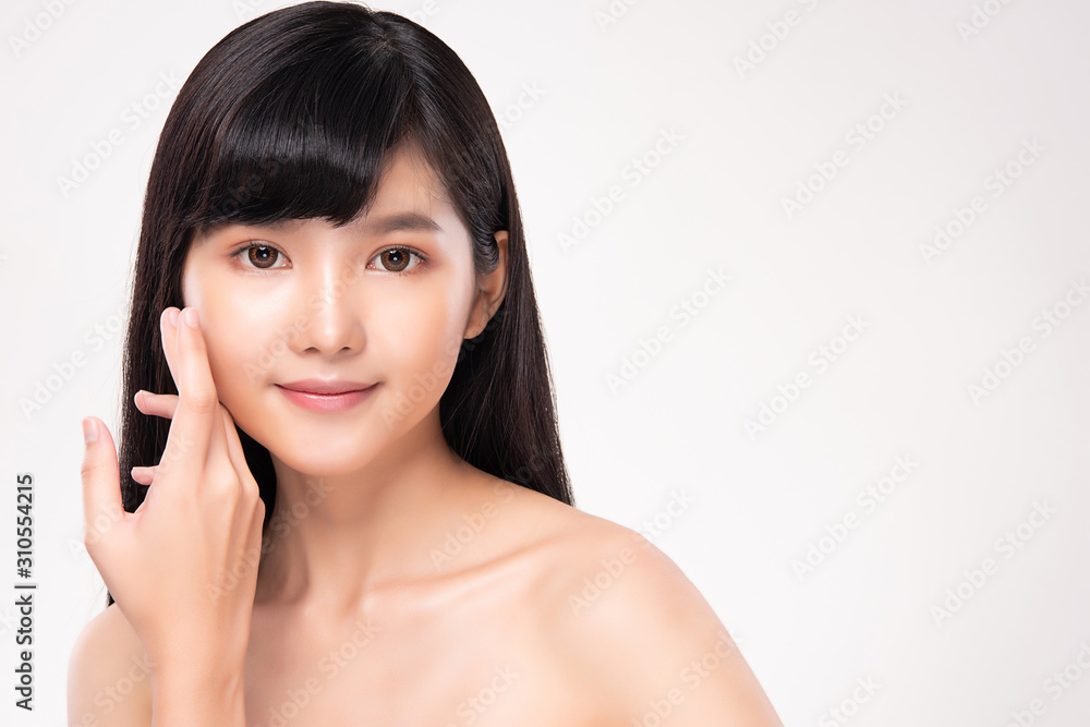 Beautiful Young Asian Woman with Clean Fresh Skin. Face care, Facial treatment, on white background, Beauty and Cosmetics Concept. Beautiful Young Asian Woman with Clean Fresh Skin. Face care, Facial treatment, on white background, Beauty and Cosmetics Concept.