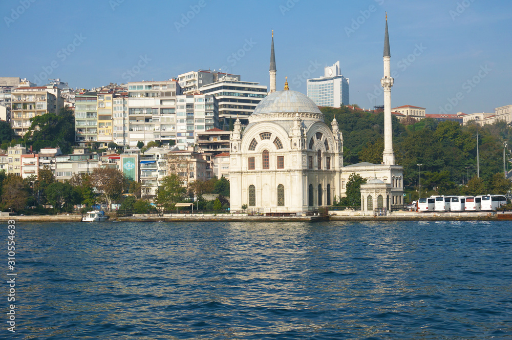 Fototapeta premium The beautiful and peaceful view of river bank inside Istanbul during sunny autumn morning.
