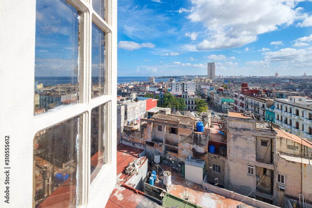 Window opening to a view of the city of Havana