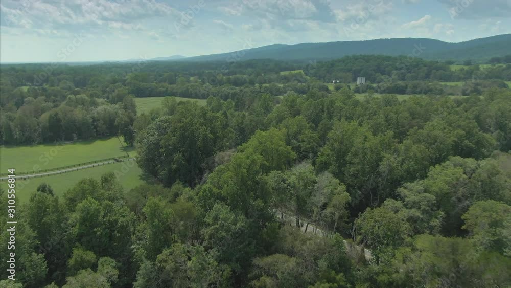 Aerial: Flying over countryside and farms in Charlottesville, Virginia, USA Aerial: Flying over countryside and farms in Charlottesville, Virginia, USA