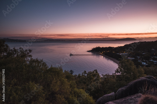 Magnetic island  Australia  view on the bay from the Hawkings point track during sunset  beautiful colourful pink sky