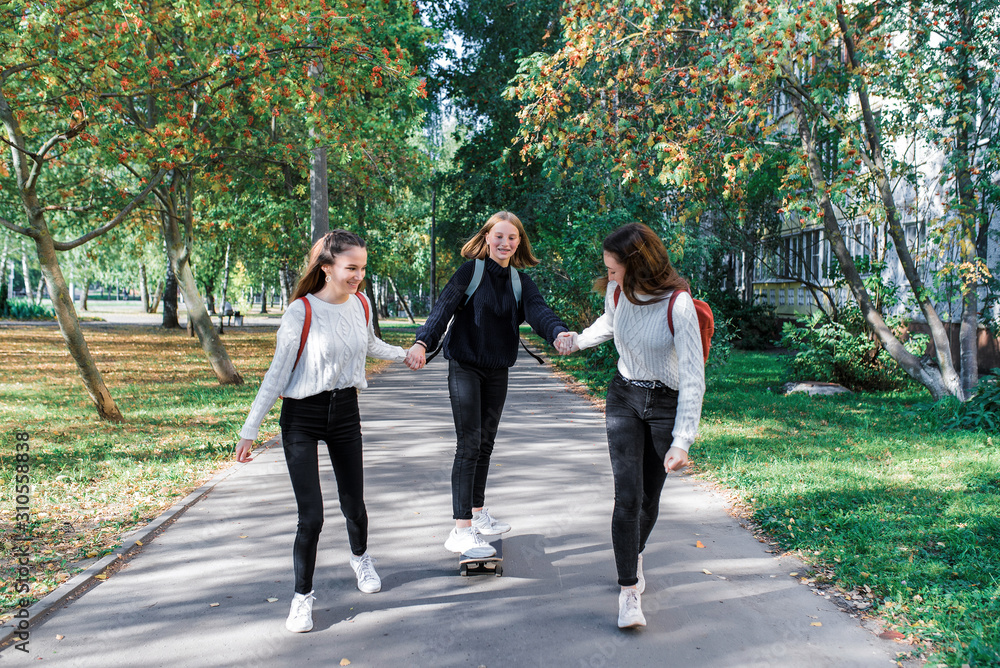 custom made wallpaper toronto digital3 girls girlfriends teenagers, ride skateboard, day city street, happy smile, rejoice have fun after school college. Emotions relaxation entertainment, walk casual wear. Sneakers jeans sweater.