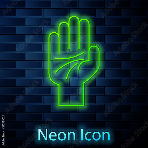 Glowing neon line Palmistry of the hand icon isolated on brick wall background. Vector Illustration