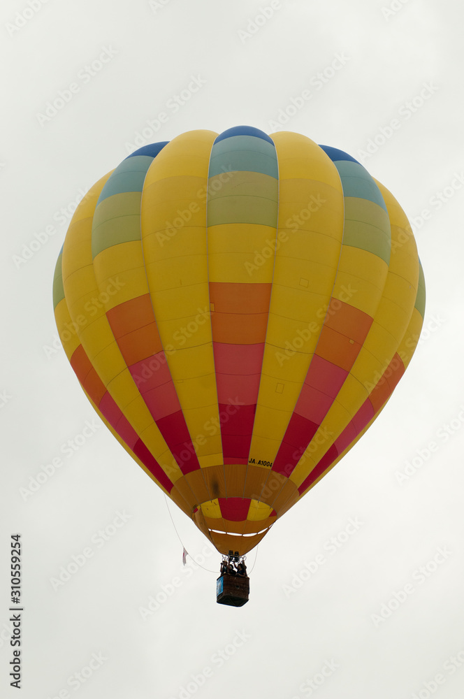 Fototapeta premium Colourful hot air balloon over Putrajaya, Malaysia.