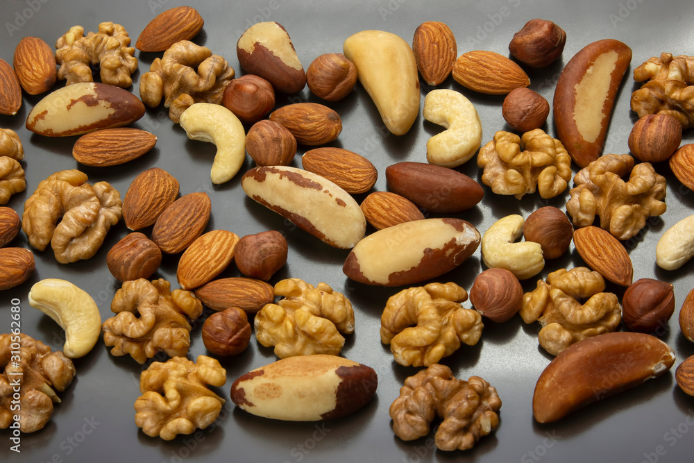 Different kinds of nuts. Healthy and protein food Different kinds of nuts. Healthy and protein food