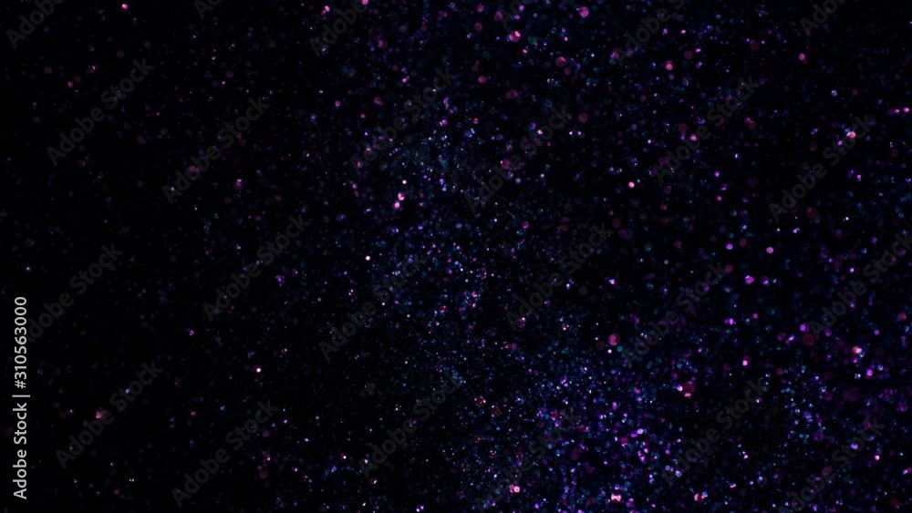 Neon Glitter Background in Super Slow Motion at 1000fps. Neon Glitter Background in Super Slow Motion at 1000fps.