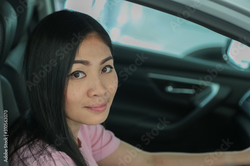 Asian girl smiling  relaxing sitting and prepare drive safety © pandaclub23