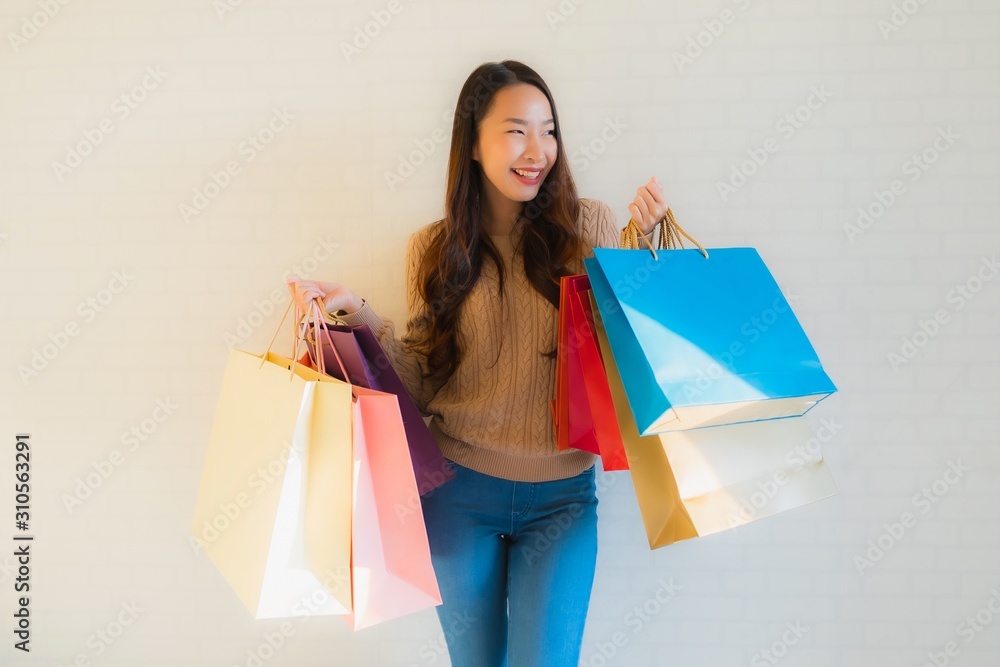 Portrait beautiful young asian women happy smile with shopping bag Portrait beautiful young asian women happy smile with shopping bag