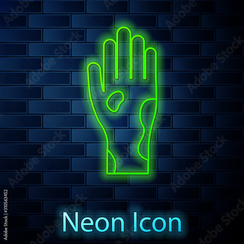 Glowing neon line Hand with psoriasis or eczema icon isolated on brick wall background. Concept of human skin response to allergen or chronic body problem. Vector Illustration