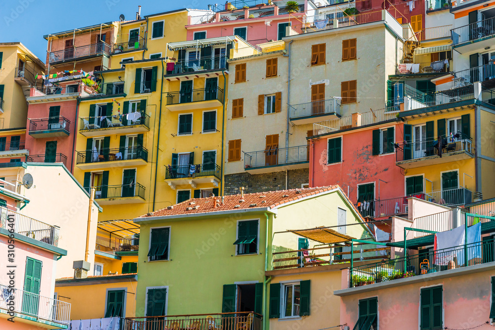 Traditional colorful ancient Italian architecture houses in Manarola village, Cinque Terre