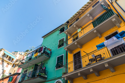 Traditional colorful ancient Italian architecture houses in Manarola village, Cinque Terre © Aleksandr Vorobev
