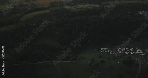 Aerial Drone view of Italian countryside during sunrise in hillside photo