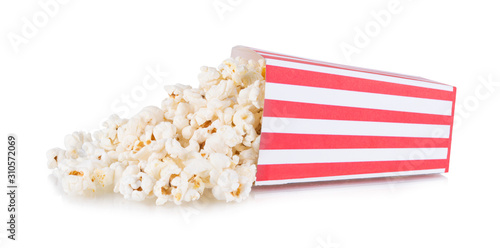 Popcorn spilled from a square box isolated on white background