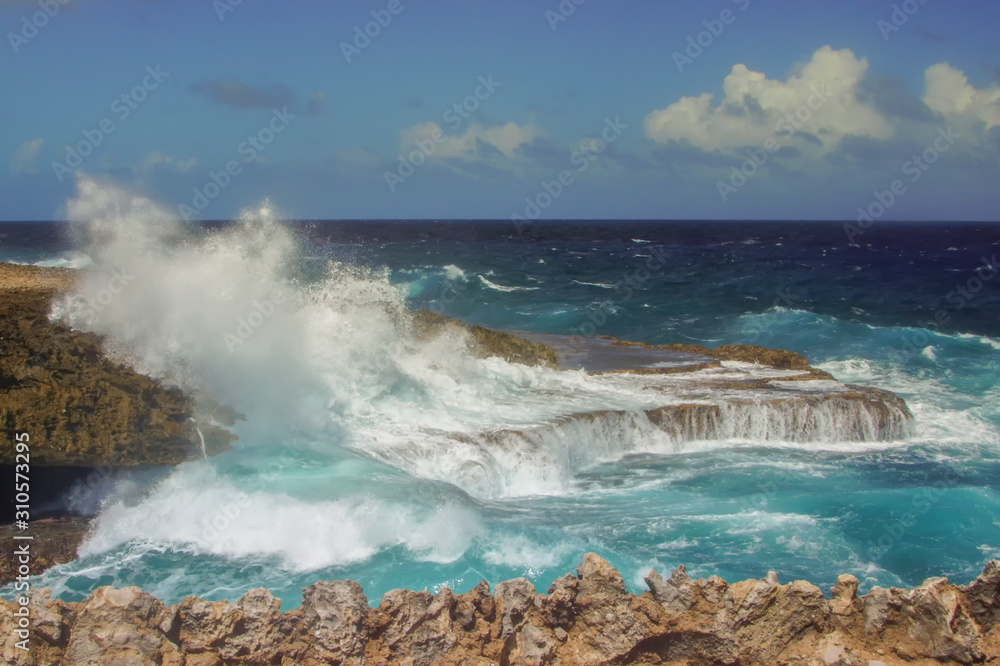 Shete Boka National park. Amazing landscape scenery around the small Caribbean island of Curacao in the ABC islands. Crashing waves at the beach and the beautiful coastline.