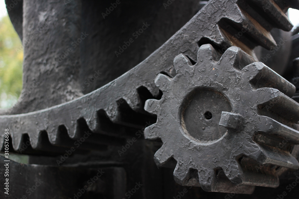 Old gears in black oil closeup concept Old gears in black oil closeup concept