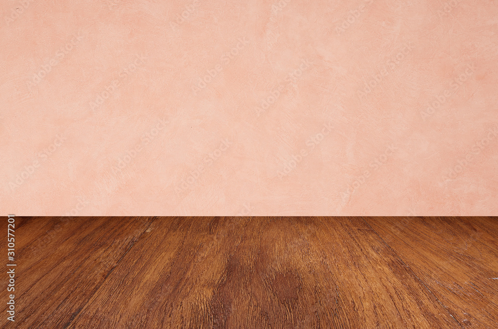 Empty wooden floors on pink wallpaper background Empty wooden floors on pink wallpaper background
