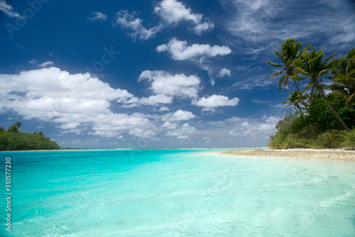 Blue sky and turquoise sea  One Foot Island  Aitutaki  Cook Islands  South Pacific