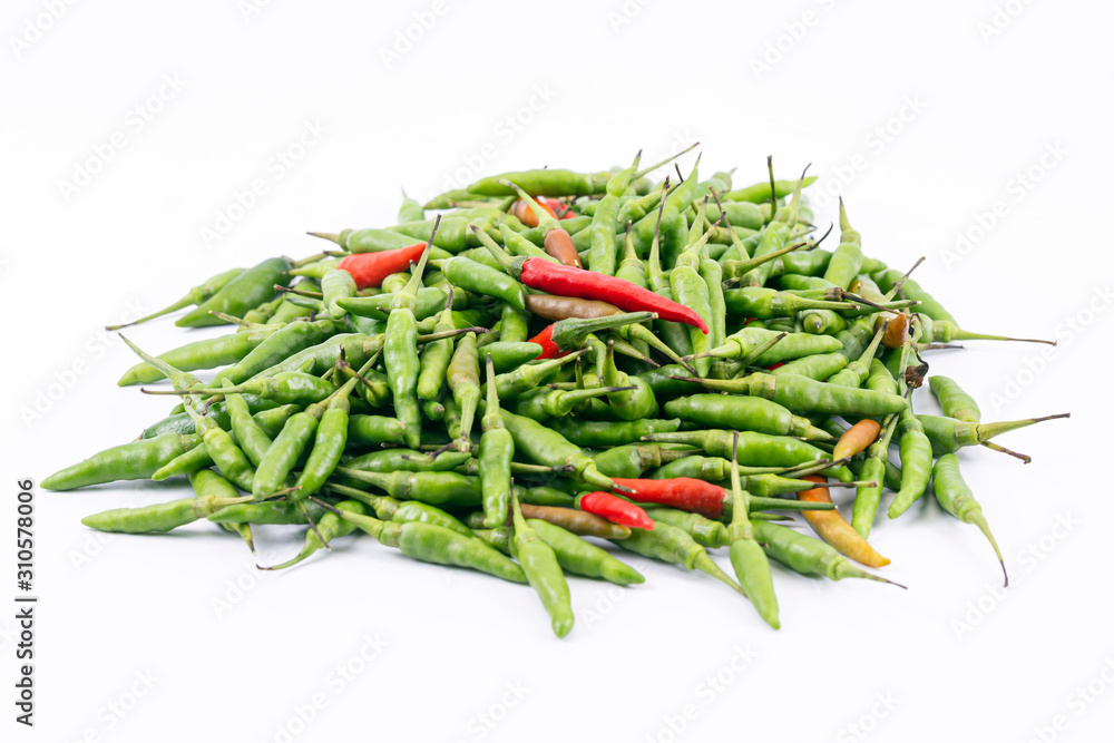 A fresh red and green bird-chilli isolated on white background A fresh red and green bird-chilli isolated on white background