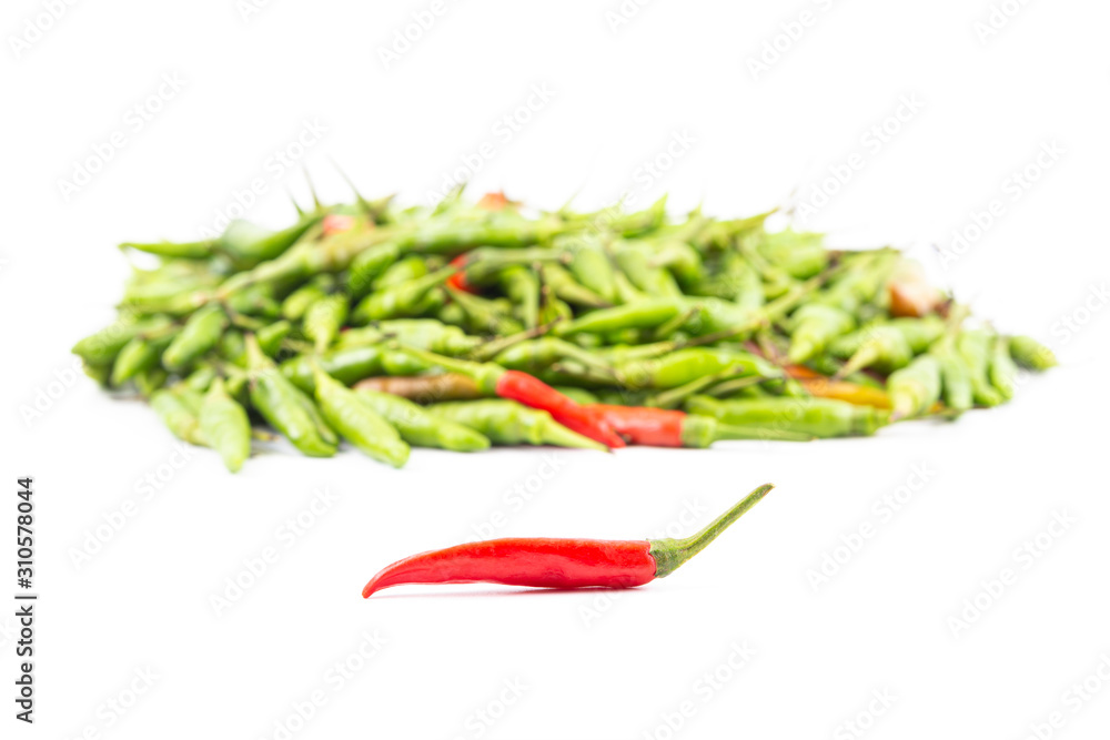 A red hot bird-chilli set in front of others blur background A red hot bird-chilli set in front of others blur background