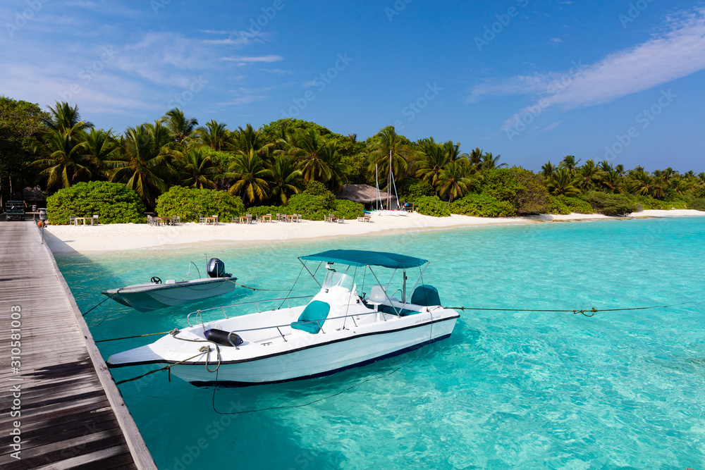 Private jetty on pristine tropical beach