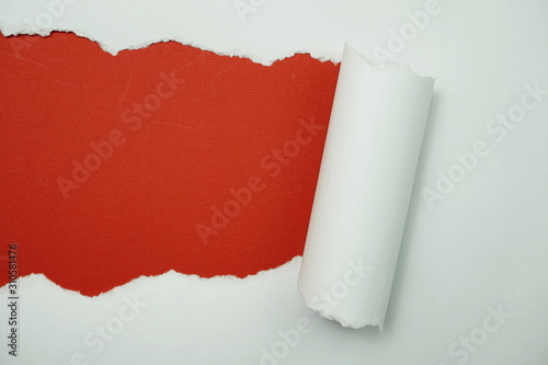 Paper torn with space copy on red background