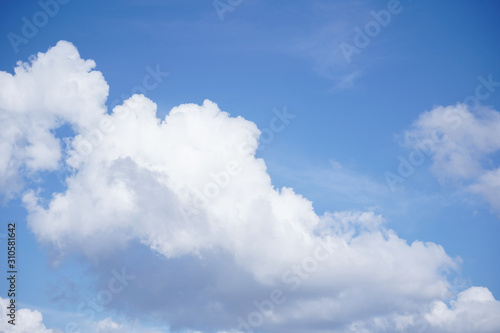 Beautiful cirrus clouds on blue sky on a sunny day background texture