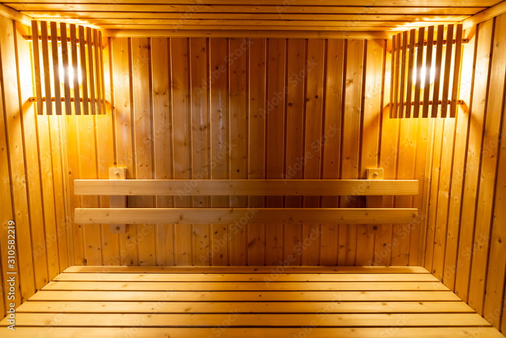 wooden bench and wall in sauna steam baked room , interior wooden bench and wall in sauna steam baked room , interior