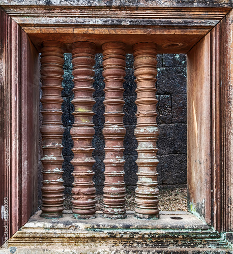 art of ancient asian baluster on window frame temple Angkorian sites in Cambodia Siem Reap, Cambodia photo