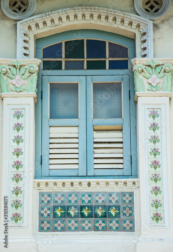 beautiful window in an old building. Singapore architecture. unusual windows. windows of the world photo