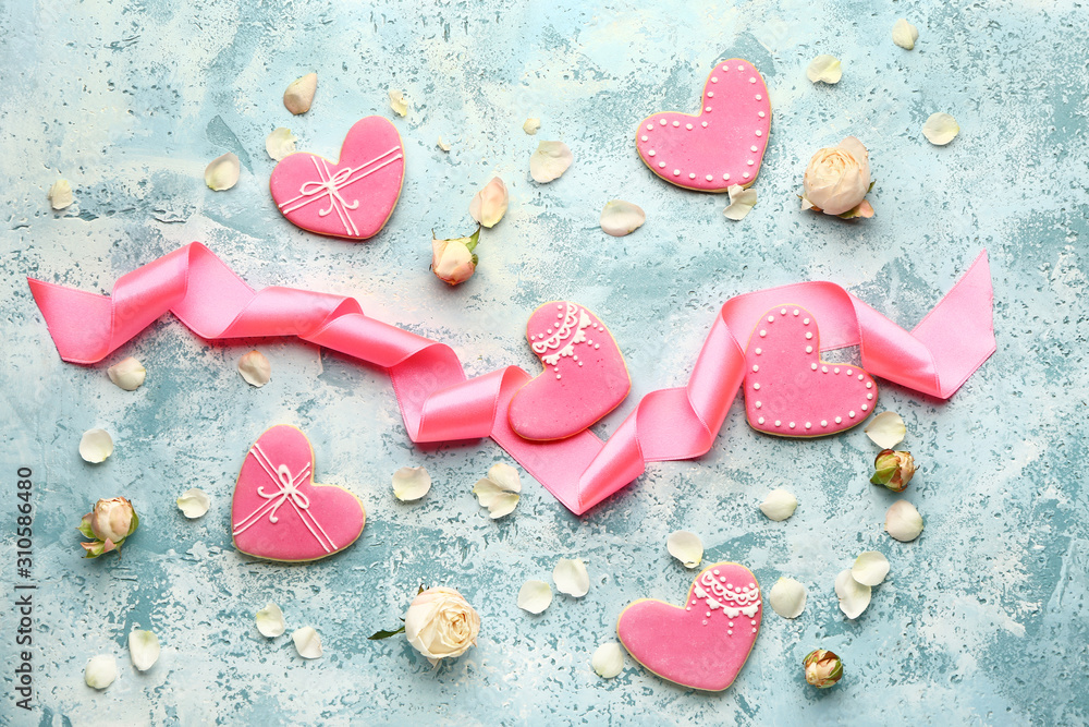 Composition with heart shaped cookies for Valentine's day on color background Composition with heart shaped cookies for Valentine's day on color background