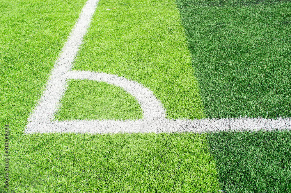 Obraz premium white line the corner Artificial turf on green grass soccer pitch ,football field