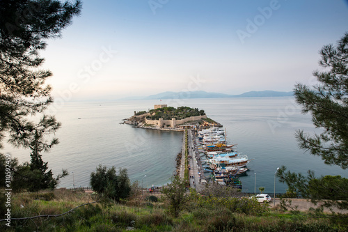 Fototapeta Naklejka Na Ścianę i Meble -  Kusadasi, Turkey. The road goes to Pigeon Island in Kusadasi. Kusadasi is a popular tourist destination in Turkey.