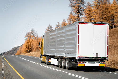 Truck on the road. Frieght transportation. photo