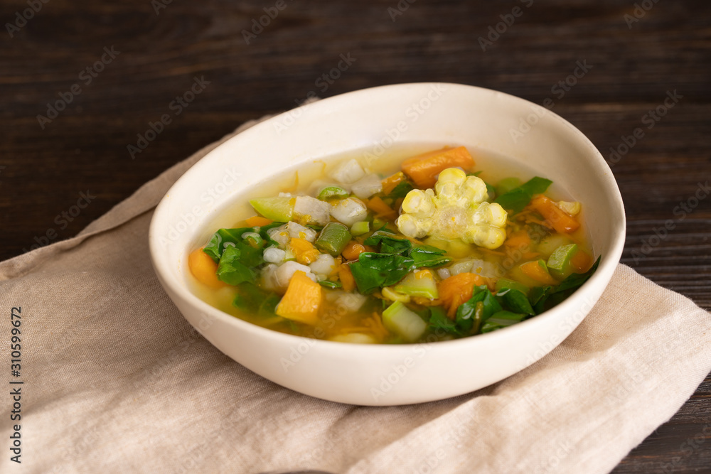 Potaje Canario,  delicious vegetable soup of Canary Island with different vegetables and chickpea. Typical Canary dish background.