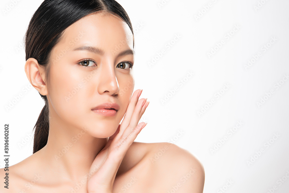 Beautiful Young Asian Woman with Clean Fresh Skin. Face care, Facial treatment, on white background, Beauty and Cosmetics Concept. Beautiful Young Asian Woman with Clean Fresh Skin. Face care, Facial treatment, on white background, Beauty and Cosmetics Concept.
