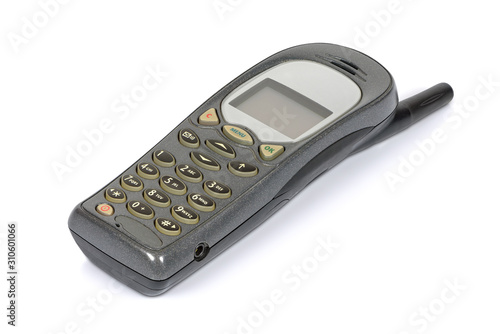 Old mobile phone on white background