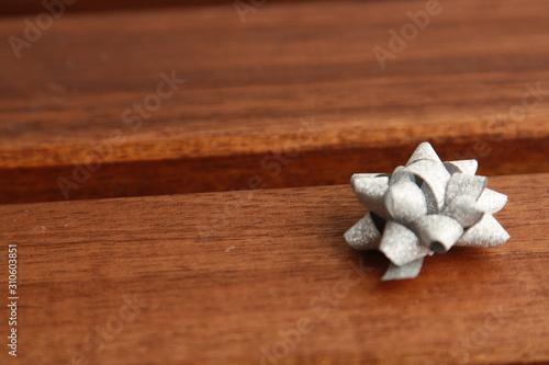 gray gift tie on wooden background