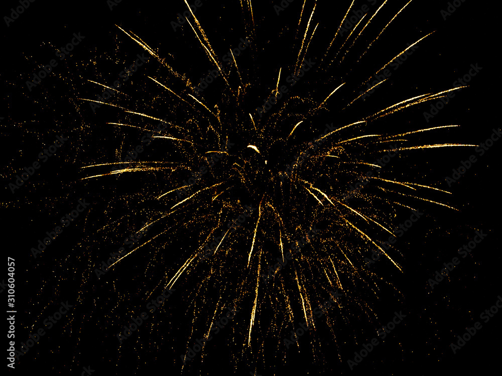 Fireworks sparkles in the night sky as background Fireworks sparkles in the night sky as background