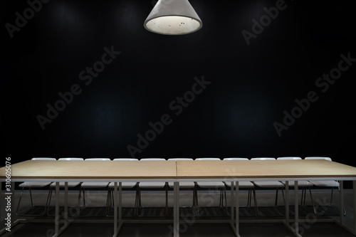 Tableau sur toile empty table and chairs on black background the last supper