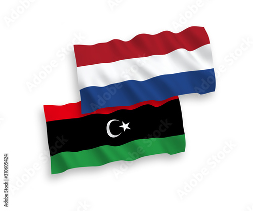 Flags of Libya and Netherlands on a white background