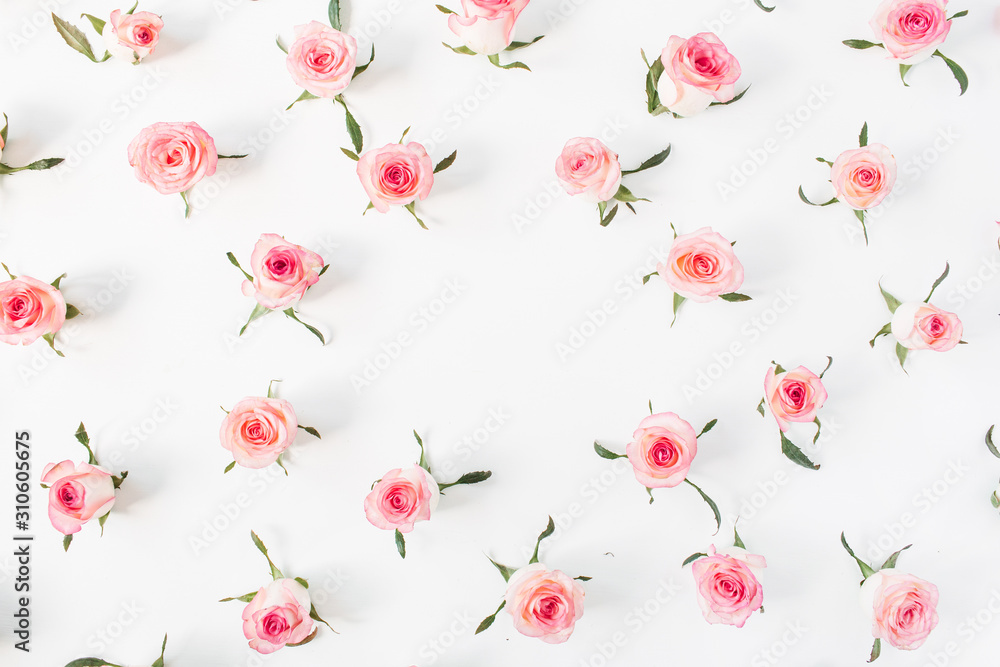 Round frame border of pink rose flower buds on white background. Mockup blank copy space. Flat lay, top view floral composition. Round frame border of pink rose flower buds on white background. Mockup blank copy space. Flat lay, top view floral composition.
