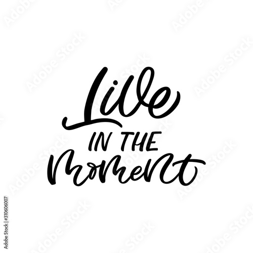 Hand drawn lettering quote. The inscription: Live in the moment. Perfect design for greeting cards, posters, T-shirts, banners, print invitations.