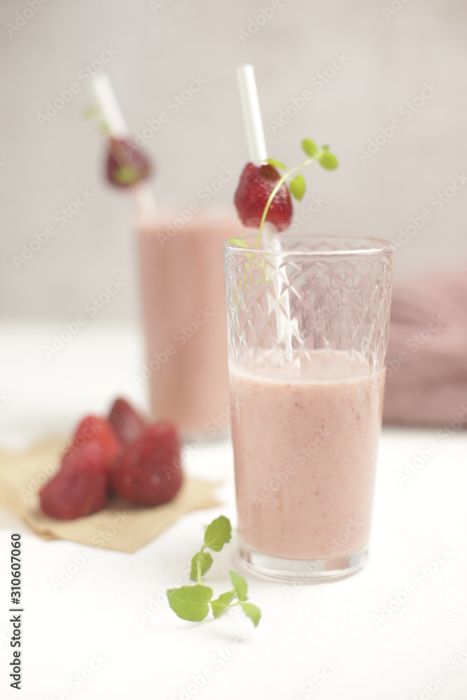 Milk and fruit cocktail from strawberries in a glass. Milk and fruit cocktail from strawberries in a glass.