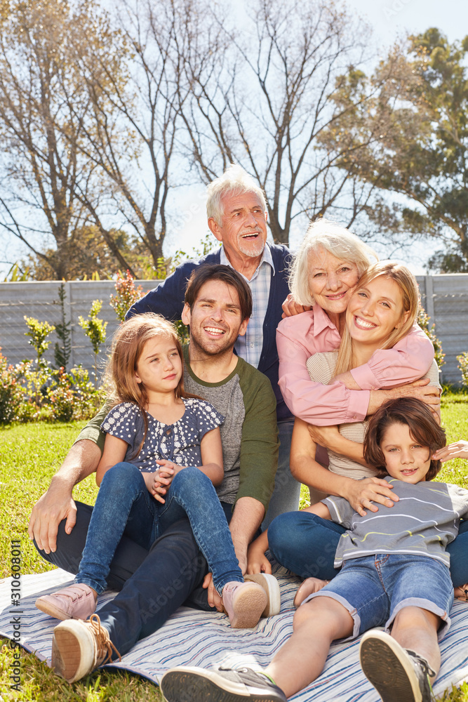 Happy extended family with children and grandparents Happy extended family with children and grandparents